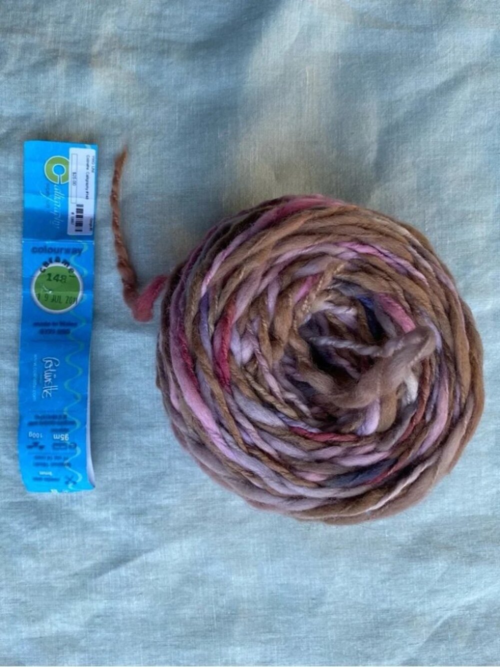 Colinette Calligraphy 100g wool yarn skein Caramel pink brown